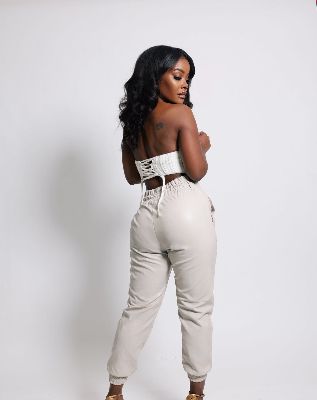 vegan leather joggers, leather joggers, womens jogger pants, chic joggers, cream pants, cream joggers, lace up joggers, vegan leather, nude joggers, casual looks, casual joggers, dressy joggers, high quality joggers